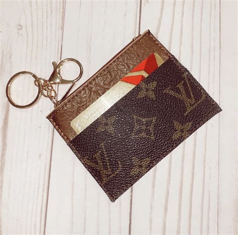 louis vuitton key chain wallet|real louis vuitton keychain.